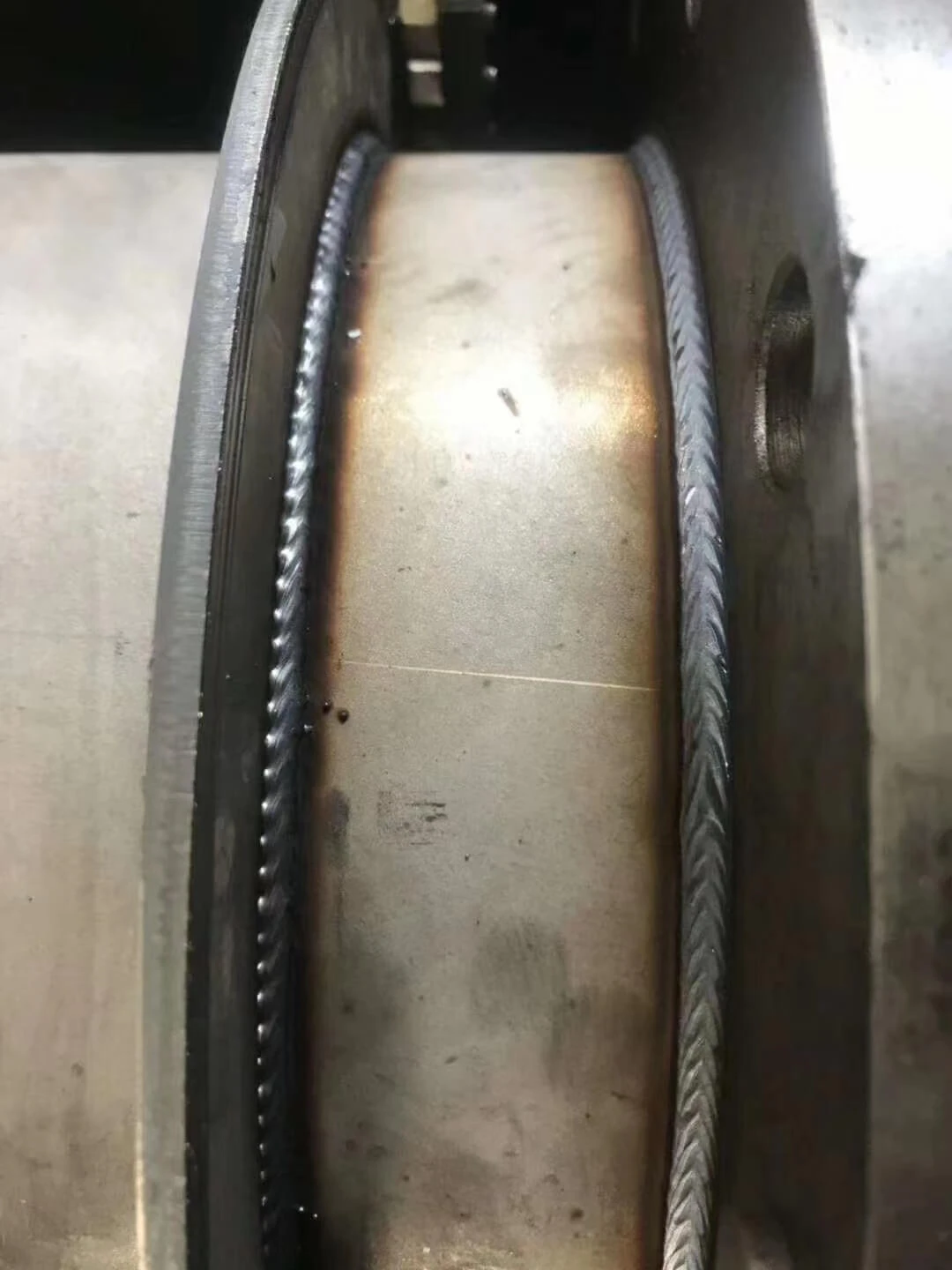 Electromagnetic flowmeter sensor welding